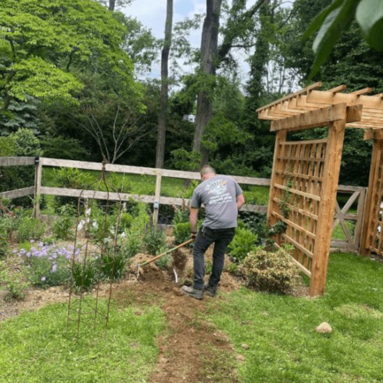 Stone Electric staff working outdoor in a lawn